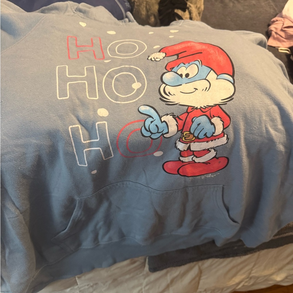 Torrid Blue Hoodie with Santa Smurf Design